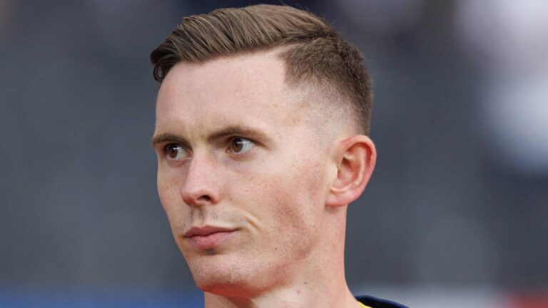 ‘Who cares?’ Dean Henderson shuns handball talk after Rooney says challenge was ‘100% a red card’ in Palace FA Cup final win