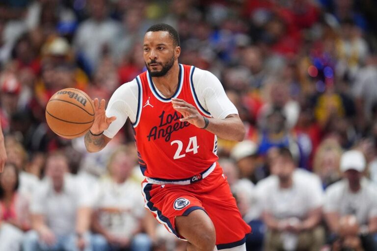 Heat land Norman Powell from Clippers in three-team trade, Kevin Love reacts at being dealt to Jazz